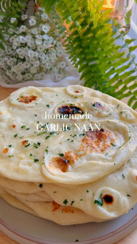 My naan is incredibly fluffy and soft, covered in garlic cilantro butter, making it perfect for dipping or on its own.  #naan #homemade Indian Nan Recipe, Homemade Naan Recipe, Best Garlic Naan Recipe, Best Naan Recipe, How To Make Garlic Naan, Recipes For Naan Bread, Naan Bread Recipe Videos, Soft Naan Recipe, Garlic Nan Recipes