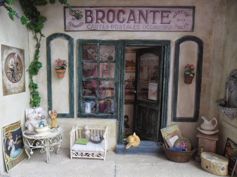 Marianne's Miniverse: A visit to my Brocante shop. ( part 1) French Courtyard, Antique Shop, Frame Stand, Window Frame, Small Tables, Antique Shops, Wallpaper Samples, Antique Items, Box Frames