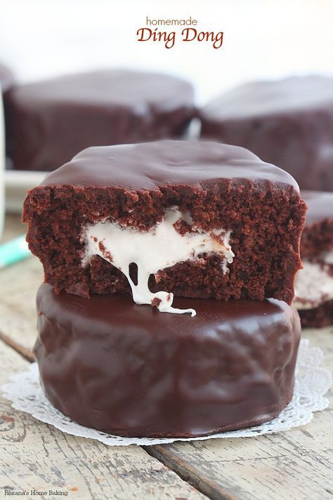 Rich chocolate cake stuffed with a gooey marshmallow filling, these homemade ding dongs are just as good or even better than the store bought ones. Homemade Ding Dongs, Cupcake Receptek, Ding Dong Cake, Ding Dongs, Chocolate Snack Cake, Marshmallow Filling, Recipes With Marshmallows, Rich Chocolate Cake, Chocolate Snacks