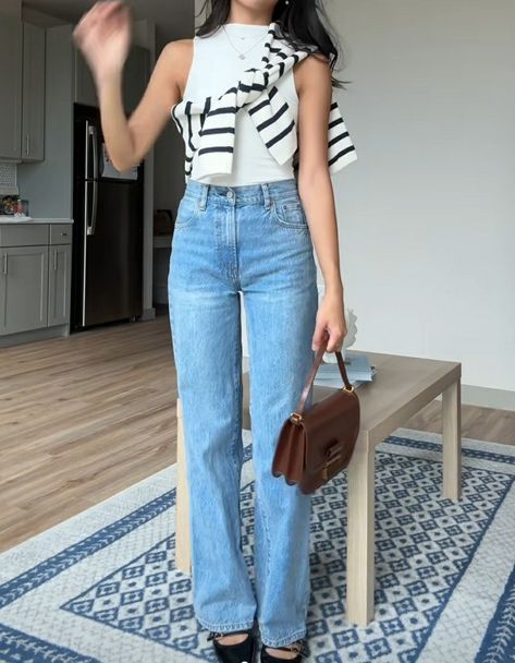 Chic Baggy Flare Jeans In Denim Blue, Light Blue Wide Leg Jeans Outfit, Light Blue Baggy Jeans For Spring, Chic Wide Leg Washed Blue Jeans, Chic Baggy Blue Jeans, White Sleeveless Top Outfit, Chic Blue Baggy Jeans, Flowy Shirt Outfit, Light Blue Wide Leg Jeans