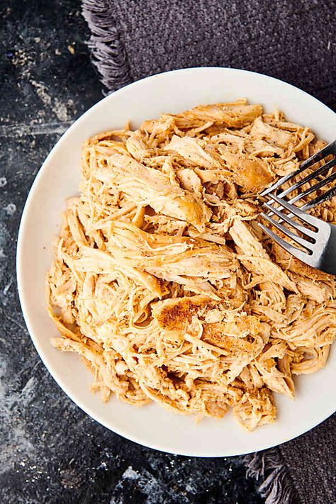 This Shredded Chicken can be made FOUR ways: stovetop, oven, crockpot, or instant pot! It's flavorful & great for any recipe that calls for cooked chicken. Chicken And Green Chili Recipes, Crockpot Mexican Chicken Recipes, Chicken Chile Verde, Crockpot Mexican Chicken, Instant Pot Shredded Chicken, Chicken Chile, Green Chili Recipes, Frozen Chicken Recipes, Easy Shredded Chicken