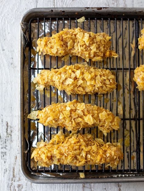 These potato chip crusted chicken fingers are so crispy and crunchy! Serve with homemade ranch and roasted broccoli for a perfect easy meal. Potato Chip Crusted Chicken, Chip Crusted Chicken, Potato Chip Chicken, Kettle Cooked Chips, Chicken Fingers Baked, Chicken And Chips, Homemade Ranch, Potato Chip, Chicken Fingers