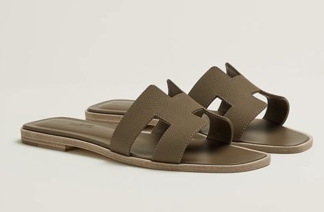 Hermes Oran Sandals in Etoupe Sandal in Epsom calfskin with iconic "H" cut-o... Hermes Oran Sandals, Hermes Style, Hermes Oran, Luxury Handbags, Designer Brands, No More, Calf Skin, Walking, Sandals