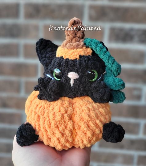 Pump yourself up for Halloween / spooky season with an adorable kitten in a pumpkin costume! Freehand pattern by me inspired from tinkeringcrochet's free ghost in a pumpkin pattern on instagram.  Approximately 6-8 inches tall.  Machine washable! (Instructions included!) For different color please message me!  -Safety eyes are not infant safe. They are for ages 3 and up **Yarn plushies are soft objects that will usually need to be "fluffed" back into place when received in the mail. Soft plushies can always be sculpted back to their original form. Also note that sometimes strings may come out of work out due to some stitching stretching. This is normal for yarn work. ** Pumpkin Cat Crochet Pattern, Halloween Crochet Stuffies, Halloween Crochet Plush, Halloween Plushies Crochet, Halloween Crochet Amigurumi, Crochet Halloween Plushies, Halloween Plushies, Pumpkin Costume, Fall Crochet Patterns