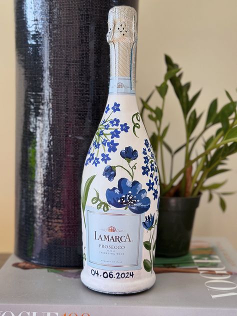 Celebrate any occasion with a hand painted bottle to commemorate it! Completely customizable! Decorate Wine Bottles For Gifts, Painted Tequila Bottle, Painting Wine Bottles, Hand Painted Champagne Bottle, Glass Blowing Art, Wine Bottle Painting, Painted Champagne Bottle, Glass Bottle Painting, Painting Bottles