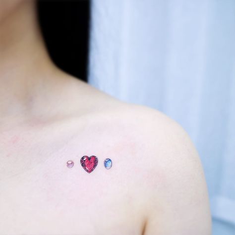 Tattoo by Heemee #Heemee #realismtattoos #hyperrealismtattoos #realism #hyperrealism #realistic #heart #gem #pearl #sapphire #moonstone #color #diamond #jewel Ruby Tattoo, Pearl Tattoo, Stone Tattoo, Gem Tattoo, Jewel Tattoo, Jellyfish Tattoo, Diamond Tattoos, Discreet Tattoos, Little Tattoos