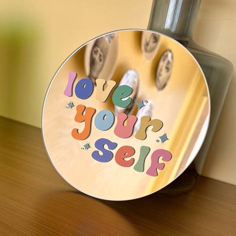 A mirror collection that will reflect your colorful point of view and leave a smile on your face every time you see/look at it. It is now very easy to associate with your mirror by choosing your motto, symbol and color. It is a stylish, aesthetic and fun product that you can use in every corner of your home, on your wall, on your table, in any area or room you want. It now transforms your living space into a more private and personal space. Cermin Aesthetic, Mirrors Design, Aesthetic Smile, Painted Mirror Art, Painted Mirror, Mirror Collection, Mirror Color, Stylish Aesthetic, Sticker Label