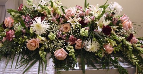 In this article, you’ll learn how to make a casket blanket to honor a loved one or the loved one of a floral design client. Designing meaningful funeral floral arrangements are a beautiful way to love the world through flowers. Diy Casket Spray, Flower Oasis, Casket Spray, Casket Flowers, Mother Of Pearl Rose, Love The World, Casket Sprays, Diy Sprays, Flower Blanket