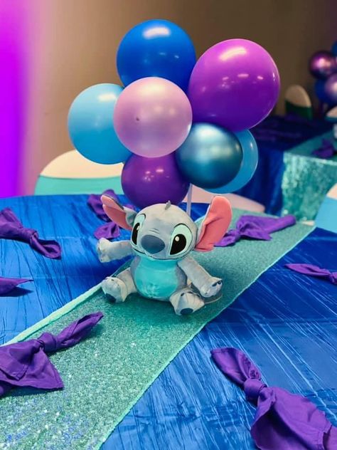 Blue And Purple Gender Reveal Ideas, Stitch Centerpiece Ideas, Lilo And Stitch Centerpieces, Stitch Centerpieces, 16 Candles Ceremony, Sweet 16 Candle Ceremony, Purple Baby Shower Theme, Stitch Decorations, Sweet 16 Candles