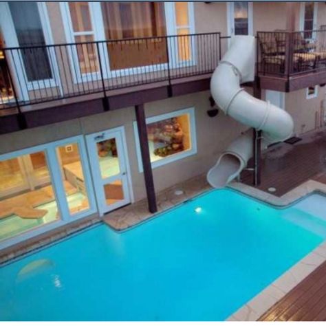 Keely, this one's for YOU and Tom!!!Indoor pool/outdoor pool with slide. House With A Pool, Second Floor Deck, Rumah Moden, Moderne Pools, Indoor Pools, Dream Pools, Indoor Swimming, Indoor Swimming Pools, Swimming Pool Designs