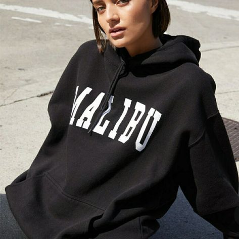 Keep Cozy In The New John Galt Malibu Varsity Hoodie. This Everyday Hoodie Has Long Sleeves, A Drawstring Hood, A Front Graphic, And A Front Kangaroo Pocket. Solid Color Hoodie Long Sleeves Front Graphic Kangaroo Pocket Ribbed Trimming Drawstring Hood 34” Bust, 26” Waist, 36” Hip Color: Black Brandy Hoodie, Red Cropped Hoodie, Brandy Melville Hoodie, Black Crop Hoodie, White Cropped Sweatshirt, Grey Cropped Hoodie, Varsity Hoodie, Black Crewneck Sweatshirt, Yellow Sweatshirt