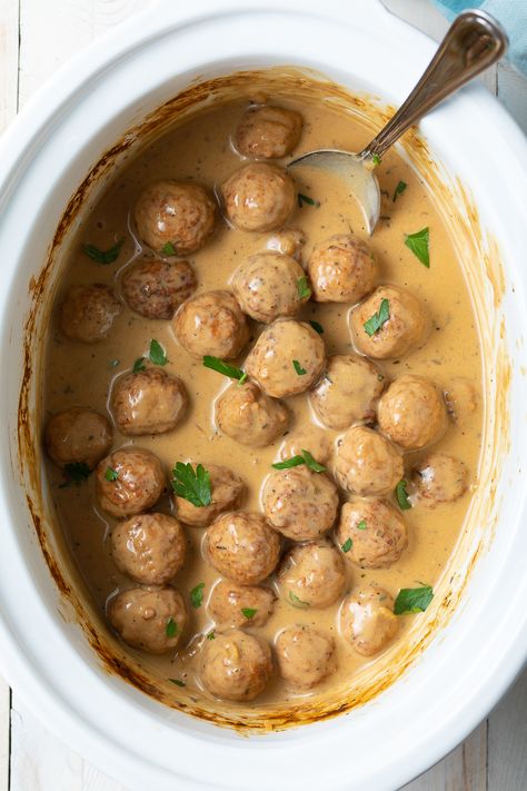 Frozen meatballs make these savory Swedish recipes, an effortless recipe to prepare as a classic party snack or comforting main dish. #aspicyperspective #foodblog #foodie #instayum #hungry #thekitchn #onmytable #dailyfoodfeed #foodlove #foodpic #instafood #foodstagram #tasty #swedishmeatballsrecipe #easyswedishmeatballs #swedishmeatballs #ikeameatballs #ikeameatballrecipe #ikearestaurant #ikea #swedish #meatballs #crockpot #slowcooker #instantpot #appetizer #partyfood Ikea Crockpot Swedish Meatballs, Game Night Crockpot Recipes, Slow Cooker Swedish Meatballs Frozen, Easy Swedish Meatball Recipe, Slow Cooker Swedish Meatballs, Swedish Meatballs Crockpot, Meatballs Crockpot, Homemade Meatballs Recipe, Swedish Meatballs Easy