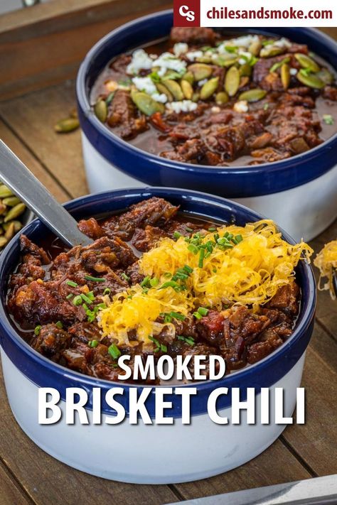 Warm up a big bowl of this award-winning Smoked Brisket Chili, the ultimate comfort food using your favorite BBQ. This recipe is spicy, savory, smoky, and so simple to prepare. Now you have another excuse to smoke too much brisket. Or is it just enough? Smoked brisket chili delivers wood-fired flavors and spice with every bite. You don’t need to cook this pot on the smoker, there will be plenty of smoky beef flavors. #chili #brisketchili #texasbrisket #smokedchili #brisket #chilirecipes Smoked Brisket Chili Recipe, Beef Brisket Chili, Brisket Chili Recipe, Smoked Brisket Chili, Cold Soups, On The Smoker, Smoked Chili, Chili Beans, Brisket Chili