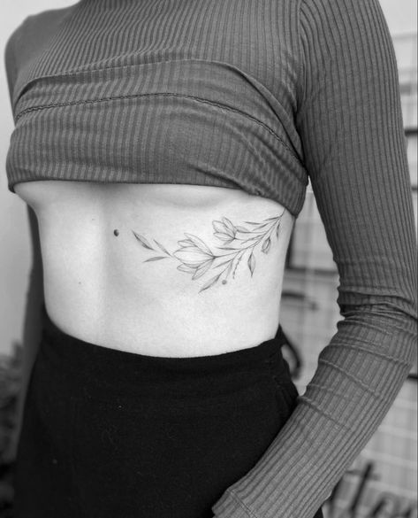 Leaves On Ribs Tattoo, Leaf Tattoo On Ribs, Botanical Rib Tattoo, Vine Ribcage Tattoo, Rib Floral Tattoo, Leaf Hip Tattoo, Floral Rib Tattoos For Women, Olive Vine Tattoo, Vine Underboob Tattoo