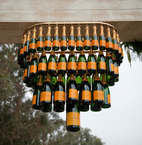 Revelry Event Designers- Veuve Clicquot Polo Classic, Los Angeles with BrownHot Events / Champagne Bottle Candelier Fall Picnic Ideas, Wooden Arches, Champagne Decor, Veuve Clicquot Polo Classic, Veuve Clicquot Champagne, Corporate Event Design, Fall Picnic, Wooden Arch, Picnic Ideas