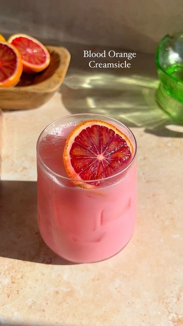 Julianna McIntosh on Instagram: "NEW RECIPE | Blood Orange Creamsicle Mocktail Every January I make a version of a Greek yogurt/creamsicle mocktail but this blood orange version may be my FAVORITE version. When I tell you, this curbed my cocktail craving so good! If you are looking for a sweet mocktail treat, this is for you! Here’s how to make it at home: In a cocktail shaker add: 2 oz blood orange juice 1/2 oz lemon juice Optional: 1 oz n/a gin 1 tbsp vanilla Greek yogurt 1/2 oz vanilla syrup Add ice and shake! Strain into a glass with ice Top with 4 oz tonic water Garnish with a citrus wheel and/or fresh mint Xoxo, cheers! #mocktail #nonalcoholic #greekyogurt #creamsicle #bloodorange #nonalcoholicdrink #mocktailrecipes #dryjanuary" Blood Orange Mocktail Recipes, Strong Coffee Recipe, Blood Orange Mocktail, Orange Mocktail Recipes, Fruity Drink Recipes, Orange Sherbert, Blood Orange Juice, Orange Drinks, Liqueurs Recipes