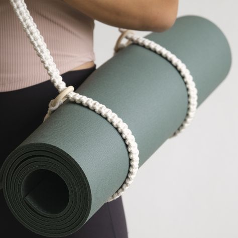 From yoga mats to picnic blankets, or even your camera stand – our hand-knotted macrame strap is the stylish, all-purpose carrier you didn’t know you needed! Make it uniquely yours or a thoughtful gift – personalize with a leather name deboss tag. #fegome #matcarrier #macrameyogastrap #macramé #customisegifts #yogakl Macrame Yoga Mat Strap Diy, Macrame Mat, Macrame Strap, Yoga Mat Strap, Camera Stand, Yoga Strap, Picnic Blankets, Yoga Mats, Yoga Mat