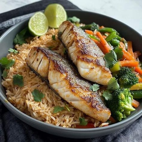 Heat Things Up in the Kitchen: Try This Spicy Coconut Rice with Fish & Veggies Recipe - NewsBreak Cheesy Broccoli Recipe, Rice With Fish, Creamy Coconut Rice, Fish Veggies, Fish And Rice, Cooked Fish, Cod Fish Recipes, Hamburger Casseroles Recipes, Seared Fish