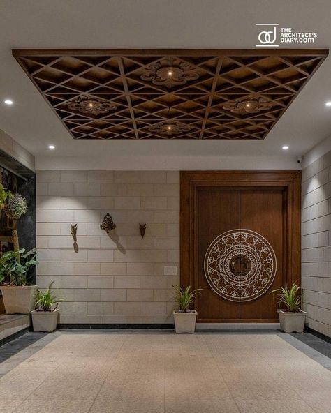 Wooden Door Main Entrance, Traditional Home Interiors Indian, Apartment Corridor Design Entryway, Indian Luxury Homes Interior Design, Indian House Entrance, Mandir False Ceiling, Main Entrance Wall Design, Main Door Entrance Design, Main Door Design Entrance