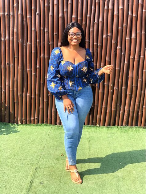 Corset Ankara Tops With Jeans, Ankara Smokey Top, Fancy Ankara Tops, Simple Ankara Tops With Jeans, Ankara Blouse Styles For Jeans, African Print Tops With Jeans, Ankara Top Styles For Jeans, Ankara Corset Top, Ankara Tops With Jeans