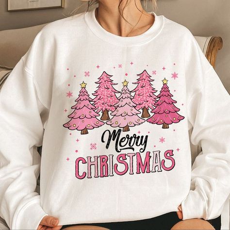 Elevate your crafting game with Cricut stencils perfect for creating beautiful holiday decor. Discover endless possibilities to personalize your projects! Sunset Color, Christmas Tshirt, Merry Christmas Shirts, Pink Christmas Tree, Pink Trees, Merry Christmas Png, Holiday Sweatshirt, Christmas Tree Design, Christmas Vibes