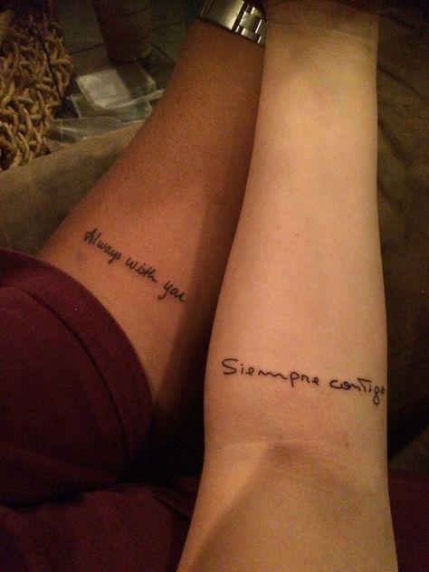 My husband and my 15 year anniversary tattoos. My handwriting on him, his on me. His tat in English (I'm American) mine in Spanish (he's from Argentina). Always with you. Mom And Daughter Tattoos Spanish, Best Friend Tattoos In Spanish, Mom And Daughter Tattoos Matching Spanish, Mother Daughter Tattoos Spanish, Spanish Matching Tattoos, Spanish Sister Tattoos, Spanish Couple Tattoos, Spanish Writing Tattoo, Always With You Tattoo