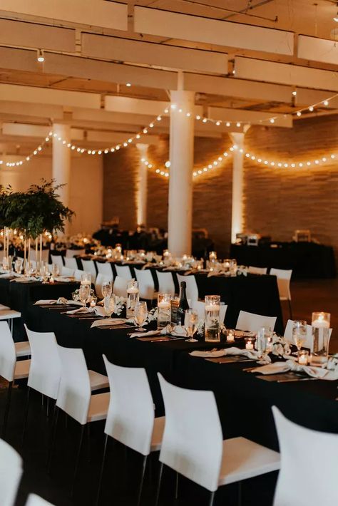 Black Table White Chairs Wedding, Black Tablecloth White Chairs, Black Linens At Wedding, White Chairs Black Table, Simple Candle Centerpieces Wedding, Black Table Linens Wedding, White Chairs Wedding, Rectangle Wedding Tables, Simple Candle Centerpieces