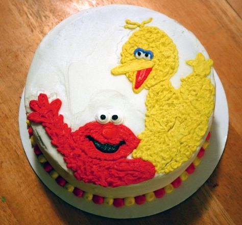 Elmo and Big Bird Cake Aunt Muffy Lincoln wants this cake for his birthday next month Big Bird Cake, Big Bird Cake Ideas, Big Bird Birthday Cake, Sesame Street Sheet Cake Ideas, Sesame Street Sheet Cake, Sesame Street Birthday Cake Buttercream, Cookie Monster And Elmo Cake, Sesame Street Party Favors, Elmo’s World Birthday Cake