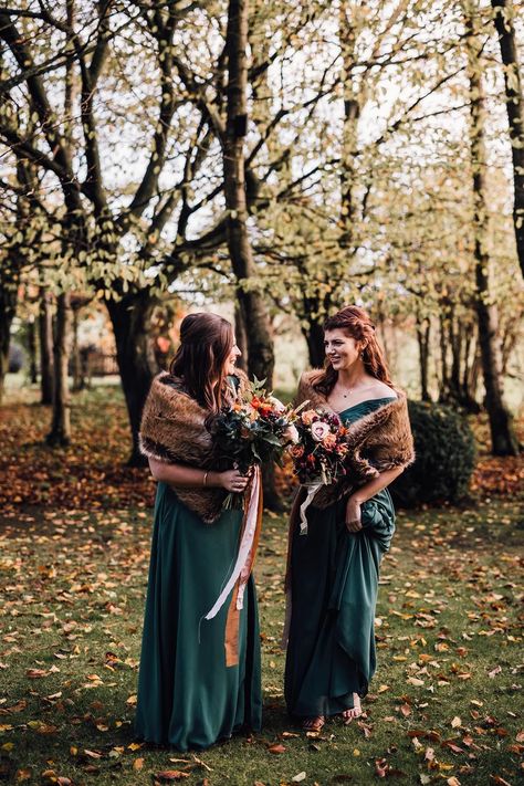 Autumn wedding with bridesmaids in emerald green dresses with faux fur shawl Autumn Bridesmaid Dresses, Beatles Themed Wedding, Wedding With Bridesmaids, Forest Green Bridesmaid Dresses, Cripps Barn Wedding, Blue Bridesmaid Dresses Short, Emerald Green Bridesmaid Dresses, Indian Bridesmaid Dresses, Fall Bridesmaids