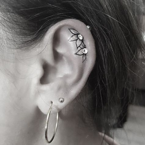 Ear Tattoo With Piercing Flowers, Small Tattoo By Ear, Ear Tattoo Inner With Piercing, Ear Flower Tattoo With Piercing, Ear Piercing And Tattoo, Flower Ear Tattoo With Piercing, Flower In Ear Tattoo, Tattoos In Front Of Ear, Inner Ear Tattoo With Piercing