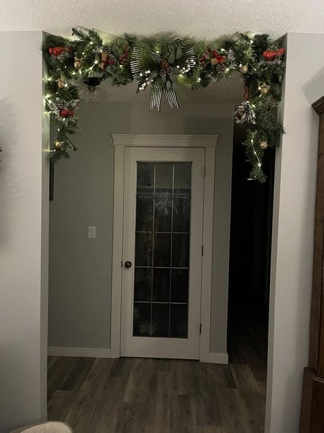 Garland On A Tension Rod, Christmas Garland Hallway Arch, Christmas Garland Doorway Tension Rod, Tension Rod Christmas Decor, Tension Rod Christmas Garland, Tension Rod Garland, Christmas Doorway Decorations, Porch Garland, Tension Rod