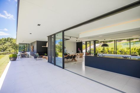 Houses With Glass Walls, Glass Back Wall House, Glass House With Pool, Glass House Event Space, Glass Wall House, Farnsworth House, Window Reflection, Covered Patios, Lake Front