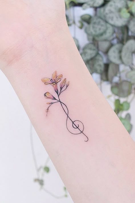 33 Delicate Wrist Tattoos For Your Upcoming Ink Session | Page 8 of 9 Small Music Tattoos, Wrist Tattoos Girls, Music Tattoo Designs, Shape Tattoo, Note Tattoo, Small Wrist Tattoos, Wrist Tattoos For Women, Disney Tattoo, Music Tattoo