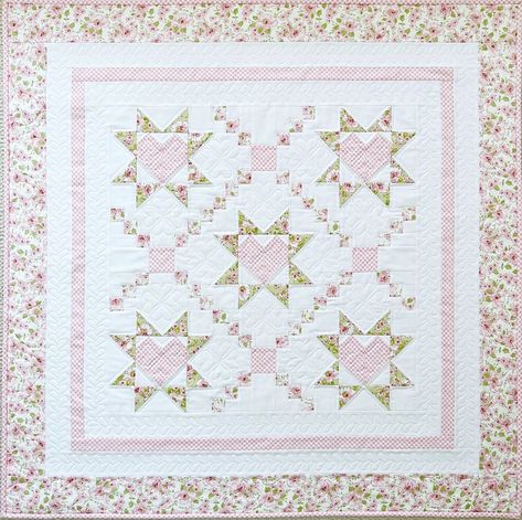 A "lovely" baby quilt pattern! The beautiful Loving Wishes quilt pattern PDF captures the feeling of wishing all the best for a little one. With dainty paths criss-crossing in the background, hearts are the center focus of each star. Gingham accents this quilt in just the right places and a wonderful border surrounds it. 5 sizes included. Easy Quilting Patterns, Crib Quilts, Easy Quilting, Bed Quilts, Heart Quilt Pattern, Baby Quilt Pattern, Baby Boy Quilts, Baby Quilt Patterns, Easy Quilt Patterns