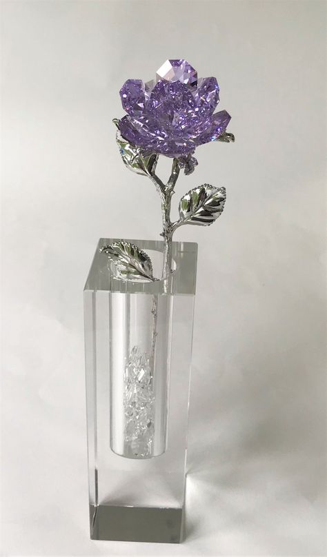 This gorgeous sparkling purple crystal Rose is handcrafted by Bjcrystalgifts using Swarovski crystals. The rose, which stands approximately 5 1/2 inches tall, sits in a crystal vase. The rosebud, which is handcrafted with Swarovski crystals, is approximately 1 1/2 inches in diameter and the stem of the rose is silver tone in color. The vase is approximately 5 1/4 inches tall and is approximately 1 1/2 inches square. The rose comes with a few Swarovski crystals to be placed in the cavity of the v Owl Food, Sweet 15 Party Ideas Quinceanera, Sweet 15 Party Ideas, Swarovski Crystal Figurines, Flower Centerpiece, New Rochelle, Baccarat Crystal, Purple Girls, Crystal Figurines