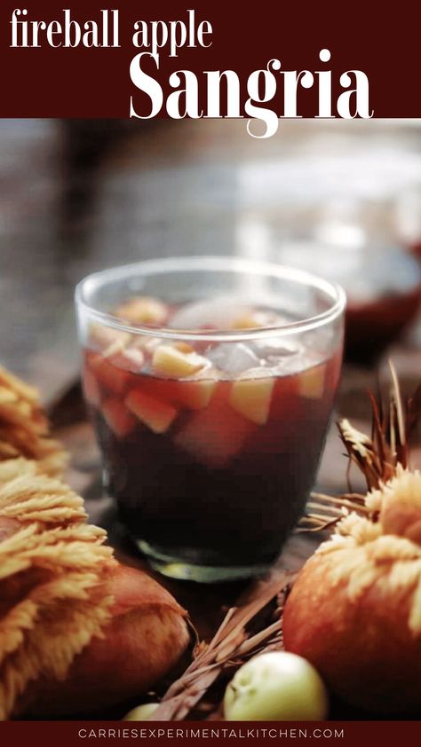 If you're looking for a new Fall cocktail, this Fireball Apple Sangria made with five ingredients is a must try. Fall Sangria With Fireball, Carmel Apple Sangria Recipes With Fireball, Caramel Apple Sangria With Fireball, Fireball Caramel Apple Sangria, Fireball Apples, Fireball Mixers, Fireball Cocktails, Apple Sangria Recipes, Fall Sangria Recipes