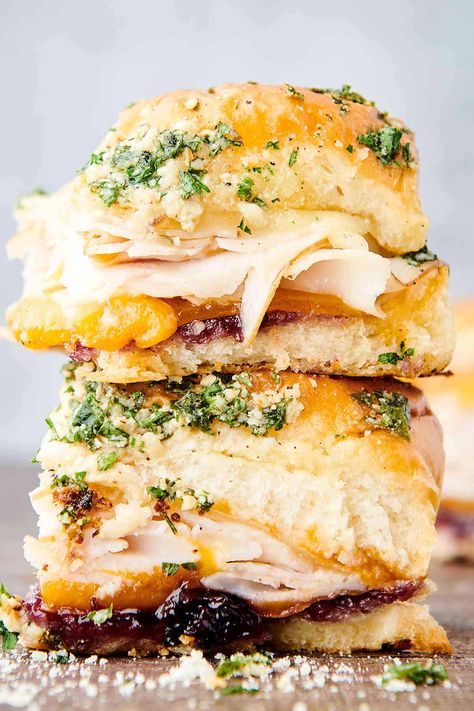 Turkey Sliders - Baked Turkey Sandwiches with Cheese and Jam Baked Turkey Sandwiches, Grinder Sandwiches, Smoked Turkey Sandwich, Cheese And Jam, Sliders Recipes Turkey, Herb Butter Sauce, Italian Sliders, Italian Grinder, Hot Turkey Sandwiches