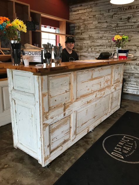 One of our custom point of sale consoles (perfect bar, too) in its new home at District Hall, Fairhope, Alabama.  Built from antique architectural antique elements and antique barn wood top. Checkout Counter Ideas, Eclectic Cowgirl, Margaritaville Bar, Boutique Counter, Antique Counter, Boutique Store Displays, Wooden Desk Chairs, Wood Bar Cart, Fairhope Alabama