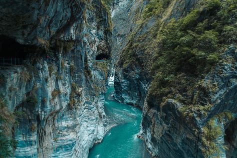 Taroko Gorge, the stunning 18 km long canyon with the pristine blue Liwu river running through it is Taiwan's most known and celebrated tourist attractions in the country and for a good reason. The Taroko Gorge is filled with extreme nature, impossible architectural wizardry, and beautiful scenic hiking trails to... Backpacking Itinerary, Taiwan Itinerary, Taroko Gorge, Taroko National Park, Backpacking Guide, Taiwan Travel, Adventure Guide, Blue River, Walking Trails