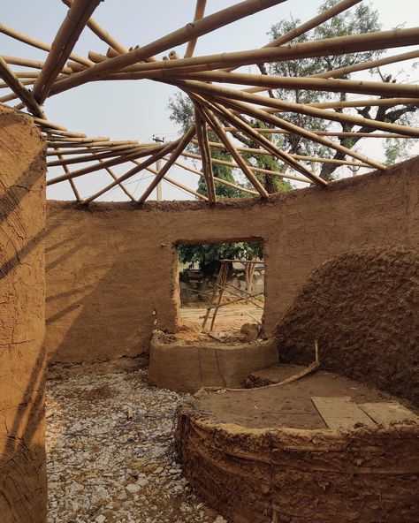 From a dream to reality, Chandrama’s transformation in one frame. Let’s feel the heart in this journey, knowing there’s always room to make it even more beautiful. Gratitude to all who shared in this journey’s beauty. Also let us know your thoughts about this before and after journey in the comment below #mudhouse #cob #cobhouse #naturalbuilding #nature #clay #mud #jaipur #mudhouseinjaipur #rajasthan #rajasthantourism #buildwithnature #sustainable #ecofriendly #onewithnature Mud Interior, Mud Brick House, Mud Homes, Bamboo Hut, Mud Brick, Clay Mud, Mud Hut, House Closet, Terracotta Roof