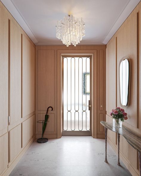 Residences | 109 East 79; entry vestibule paneled in wire-brushed European oak Foyer Cabinet, Interior Floor Plan, Recessed Medicine Cabinet, Large Foyer, Glass Shower Enclosures, Oak Panels, Entrance Foyer, Wall Trim, Parisian Apartment