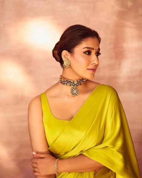 Nayanthara in a yellow 💛 saree stands as the quintessential festive look. To order please message us or whatsapp to 9600717755 . Follow us for Designer Sarees and Blouse Ideas updates @manthreecollections . . . @nayanthara . . . . . Tag your picture with #manthreecollections to get featured on this page . . #bridalblouses #handembroidery #blouse #designerblouse #blousedesigns #designerblouseideas #weddingblouse #saree #sareelove #loveforsaree #stoneworkblouse #kanjeevaram #wedmegood #wedding... Nayanthara In Saree, Indian Outfits Modern, Stone Work Blouse, Long Blouse Designs, Blouse Ideas, Saree Draping Styles, Saree Poses, Yellow Saree, Wedding Blouse