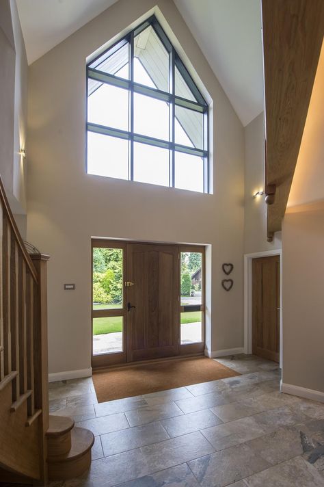 Once inside the large open hallway is lit up by the shaped apex frame #glazing #aluminium #bespoke #shapedwindow #apex #curtainwalling #entrance #hallway #express #renovation #traditional Large Open Hallway Ideas, Large Entrance Way Ideas, Open Plan Hallway Entrance, Hallway Ideas Large, Hallway Front Door Entrance Inside, Big Upstairs Hallway Ideas, Staircase Entrance Design, House Entrance With Stairs, House Hallway Ideas Entrance