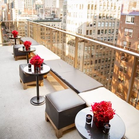 NYC Rooftop with modern, black furniture and red floral and berry centerpieces by Cincinnati wedding planner Viva Bella Events wedding planner Berry Centerpieces, Modern Black Furniture, Red Floral Centerpieces, 007 Theme Party, Gala Inspiration, 007 Theme, London Rooftop, 007 Party, 007 Casino Royale