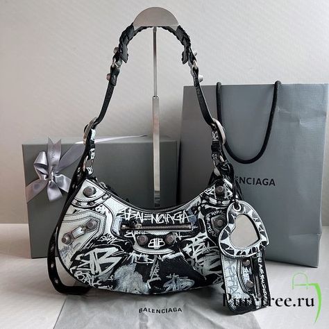 Balenciaga Le Cagole Small Shoulder Bag Graffiti In Black 33x16x8 cm - puretree.ru Balenciaga Graffiti Bag, Balenciaga Track Black, Graffiti Bag, Balenciaga Track, Raffia Bag, Small Shoulder Bag, Blue Velvet, Collar And Leash, Blue Bags