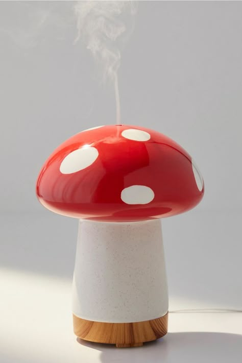 This fun essential oil diffuser looks like a whimsical toadstool mushroom with a white polka-dotted red cap. Mushroom Room Decor, Mushroom Bedroom, Lash Room Ideas, Bathroom Containers, Toadstool Mushroom, Cottagecore Room Decor, Lash Room, Mushroom Decor, Red Cap