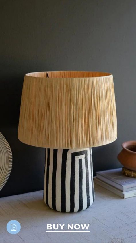 The bold black and white contrasting table lamp has a modern design with arching dark bands and a natural raffia shade. Lively and playful, it would be perfect as a desk accent lamp or brighten a dark corner. Paper Mache Table, Paper Mache Lamp, Black White Table, Black And White Paper, Wood Fuel, Unique Table Lamps, Colorful Space, Table Lamp Design, Black Table Lamps