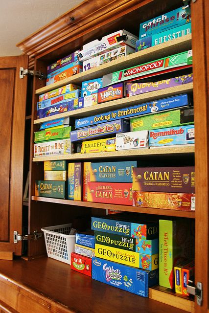 Organized game hutch. Armoire Redo, Armoire Repurpose, Loft Playroom, Basement Games, Armoire Makeover, Tv Armoire, Board Game Storage, Board Game Organization, Craft Cabinet