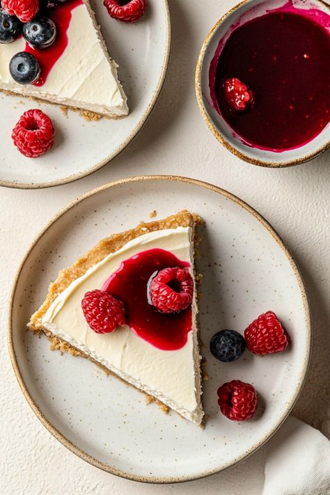 Indulge in the creamy and decadent goodness of a homemade Greek yogurt no-bake cheesecake. This light and refreshing dessert is perfect for summer gatherings, potlucks, or simply satisfying your sweet tooth. With a smooth texture and tangy flavor, this delightful treat will be a crowd-pleaser at any event. Easy to make with simple ingredients, this Greek yogurt no-bake cheesecake is a hassle-free dessert option that will impress your guests without spending hours in the kitchen. Best Greek Yogurt, Greek Yogurt Cheesecake, Yogurt Cheesecake, Homemade Greek Yogurt, Healthy Cheesecake, Healthy Greek Yogurt, Greek Yogurt Recipes, Baked Cheesecake Recipe, Raspberry Sauce