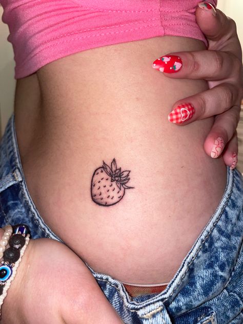 harry styles inspired strawberry tattoo Cute Tattoos Strawberry, Strawberry Tattoo On Hip, Leg Tattoos For Women Thigh Tat Small, Line Work Strawberry Tattoo, Strawberry Behind Ear Tattoo, Strawberry Tattoo Aesthetic, Strawberry Wrist Tattoo, Strawberry And Cherry Tattoo, Matching Strawberry Tattoo